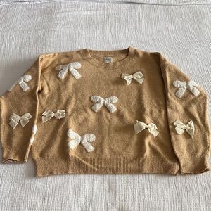 Maeve Camel Crewneck Sweater with Cream Bow Appliqués / M